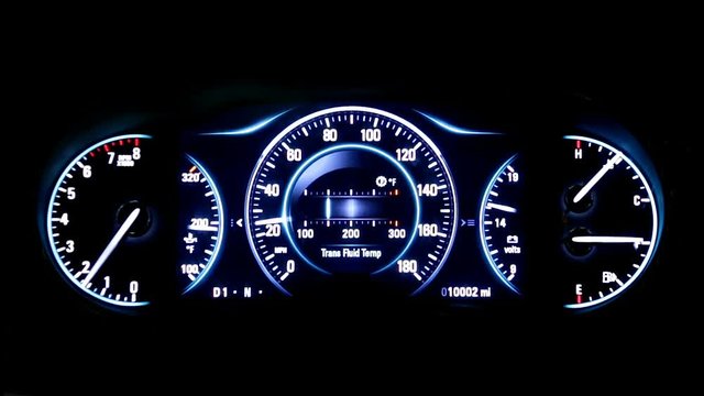 Modern light car mileage (dashboard, milage) isolated on a black background. New display of a modern car. RPM, Fuel indicator and temperature. Sport. mph.