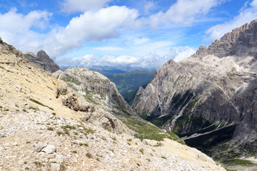 Fototapeta na wymiar Alpine Hut Zsigmondyhütte, valley Fischleintal and mountains panorama in Sexten Dolomites, South Tyrol, Italy