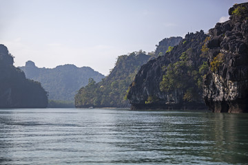 Sea bay surrounded by picturesque cliffs and jungle, Langkawi