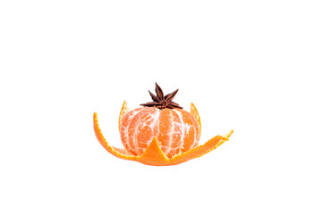 Fresh juicy bright mandarin decorated with anise and vanilla sti