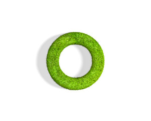 Grass letter O in lowercase format from top angle with shadow on ground.