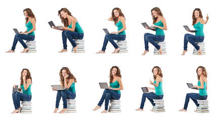 Student with netbook sitting on books