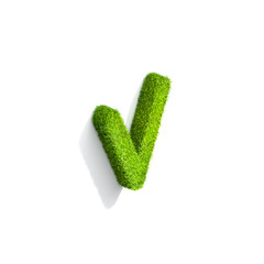 Grass letter V in lowercase format from isometric angle with shadow on ground.