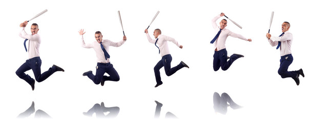 Fototapeta premium Jumping businessman with baseball bat