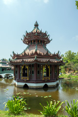 Naklejka premium Architecture of Thailand. Temple in the middle of the lake