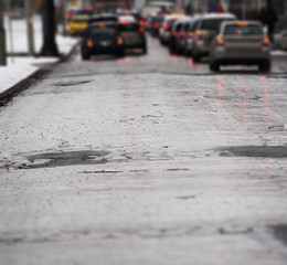 Traffic jam in the city, winter, defocused cars, vintage effect,