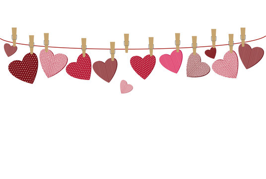 Red hearts  with a picture hanging on a rope. Valentine's Day. 
