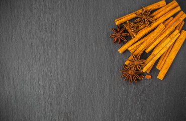 Mulled wine ingredients spices. Anise, cinnamon, cardamom on sto