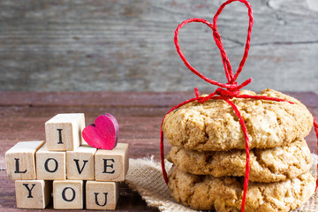 i love you inscription and homemade oat cookies