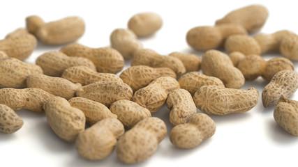 CLOSE UP: Peanuts on white background