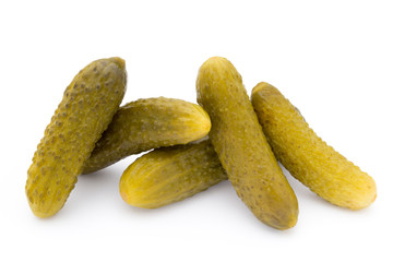 Marinated pickled cucumbers isolated on the white.