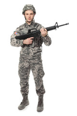 Soldier with assault riffle on white background