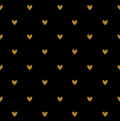 Seamless pattern with gold little hearts on black.