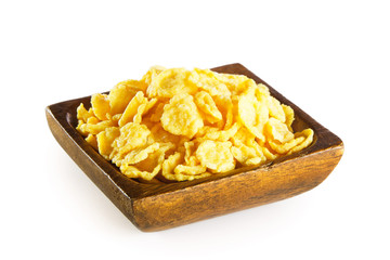 Cornflakes in wooden bowl