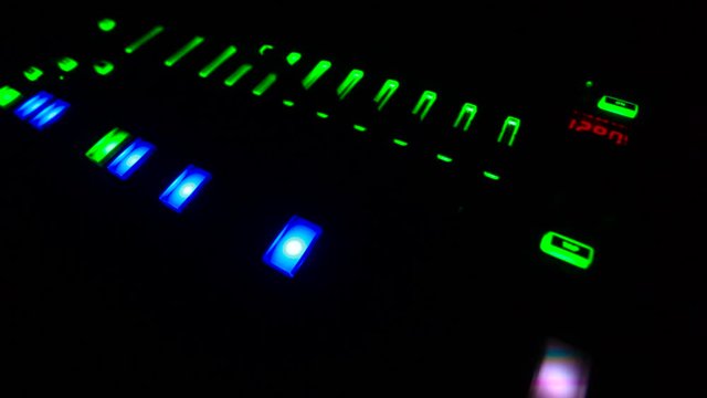 Synth Bass in The Dark With Glowing Lights