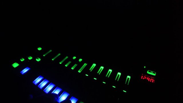 Synth Bass in The Dark With Glowing Lights