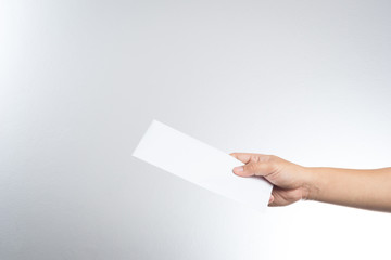 Obraz premium hand holding envelope