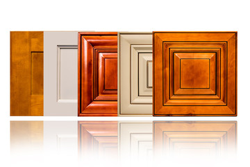 Set of luxury kitchen modern doors made of natural wood for home interior decoration. © StudioDin