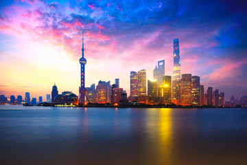 Shanghai, China city skyline on the Huangpu River. - obrazy, fototapety, plakaty
