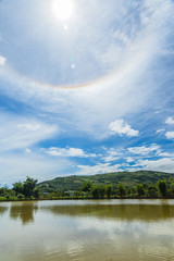 Sun corona on blue sky