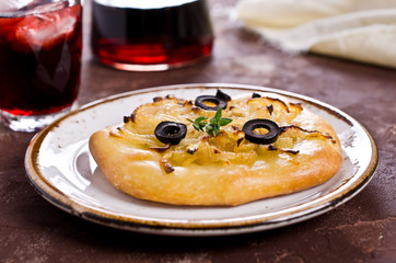 Open pie with onions