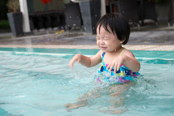 Fototapeta na wymiar Toddler in the pool