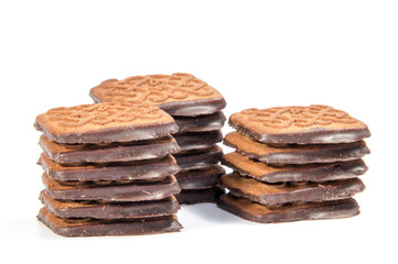 Chocolate cookies with cream filling isolated on white background.