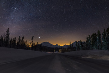 Oregon Cascade Mountain Wonderland Cascade Lakes Scenic Byway, Oregon Clear and cold magical high mountain night sky with four cascade volcanic peaks 