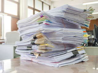 Business Concept, Pile of unfinished documents on office desk, Stack of business paper