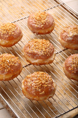 Traditional Polish homemade donuts with liqueur and walnuts
