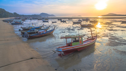Fototapeta premium aerial view fishing boats during sunrise time 