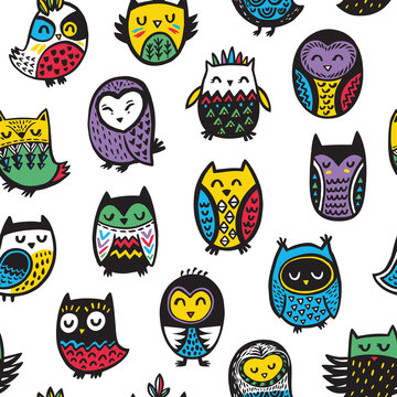 Seamless pattern with tribal owls