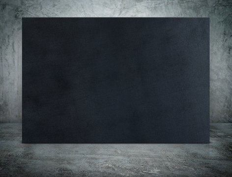 Blank Long Black Canvas Frame At Grunge Concrete Room,Mock Up Te