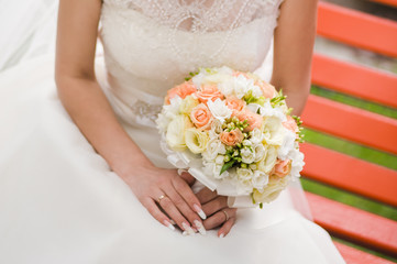 Beautiful bride with bouquet before wedding ceremony