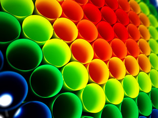 Multi colored plastic tubes background. 3D illustration