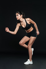 Attractive fitness girl running