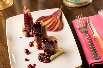 Deer steak with fruit jam and wine