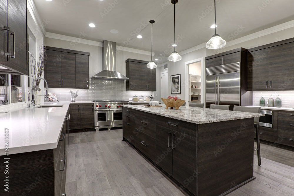 Wall mural modern gray kitchen features dark gray flat front cabinets paired with white quartz countertops and 