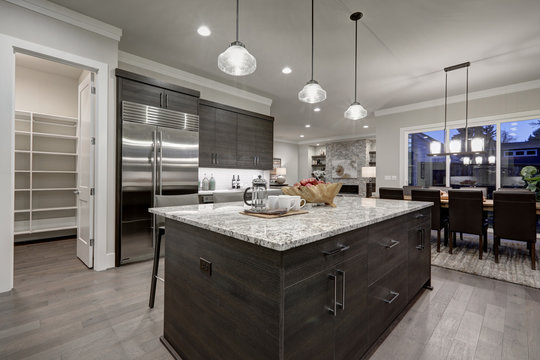 Modern Gray Kitchen Features Dark Gray Cabinetry