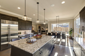 Modern gray kitchen features dark gray cabinetry
