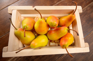 Wooden crate with pears