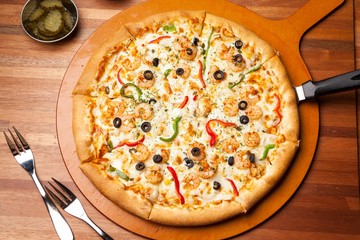 shrimp pizza on plate