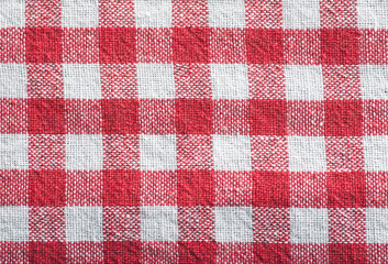 Checkered white-red napkin flat lay abstract background