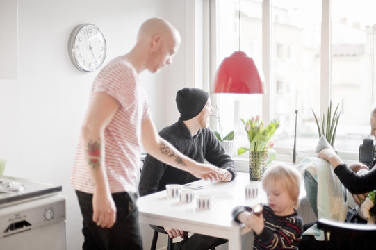 Family in domestic kitchen