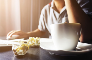 businessman working on the laptop with warm fall colors, soft-focus in the background. over sunlight