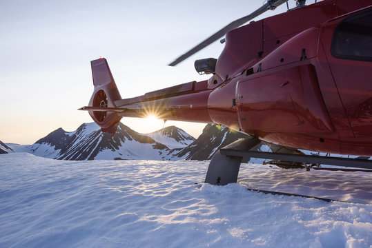 Helicopter on snowy peak
