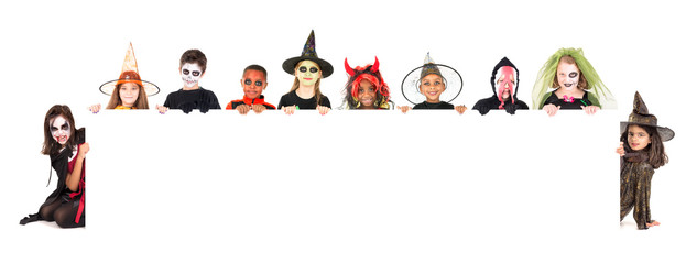 Kids in Halloween costumes