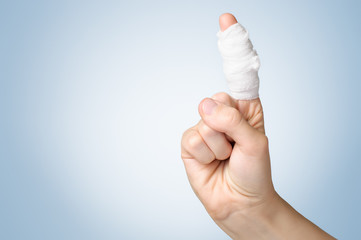 Injured finger with bandage