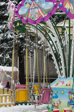 Swing on a children's carousel