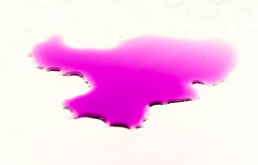 Water drops on glass on pink background